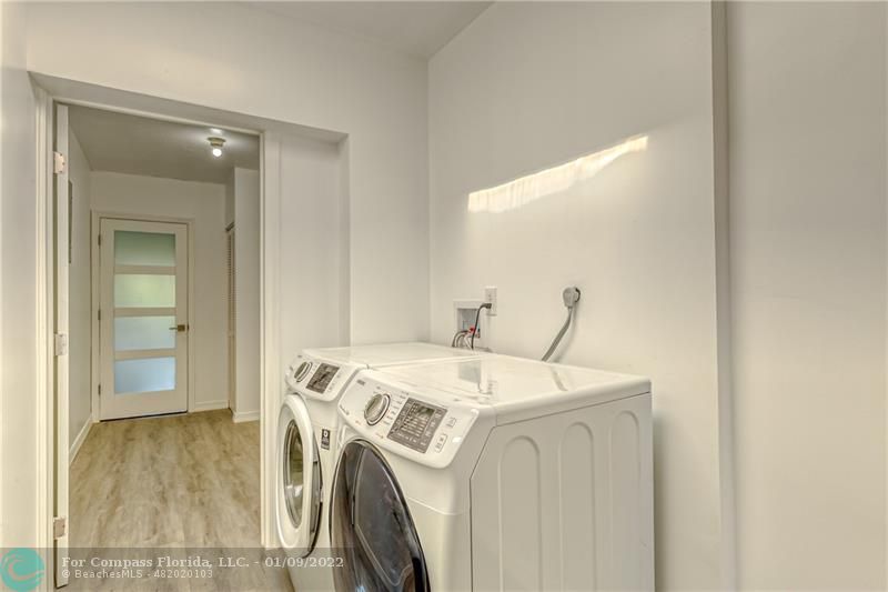 5709 Bamboo Circle Tamarac, FL 33319 - Photo 37 of 47 a utility room with dryer and washer