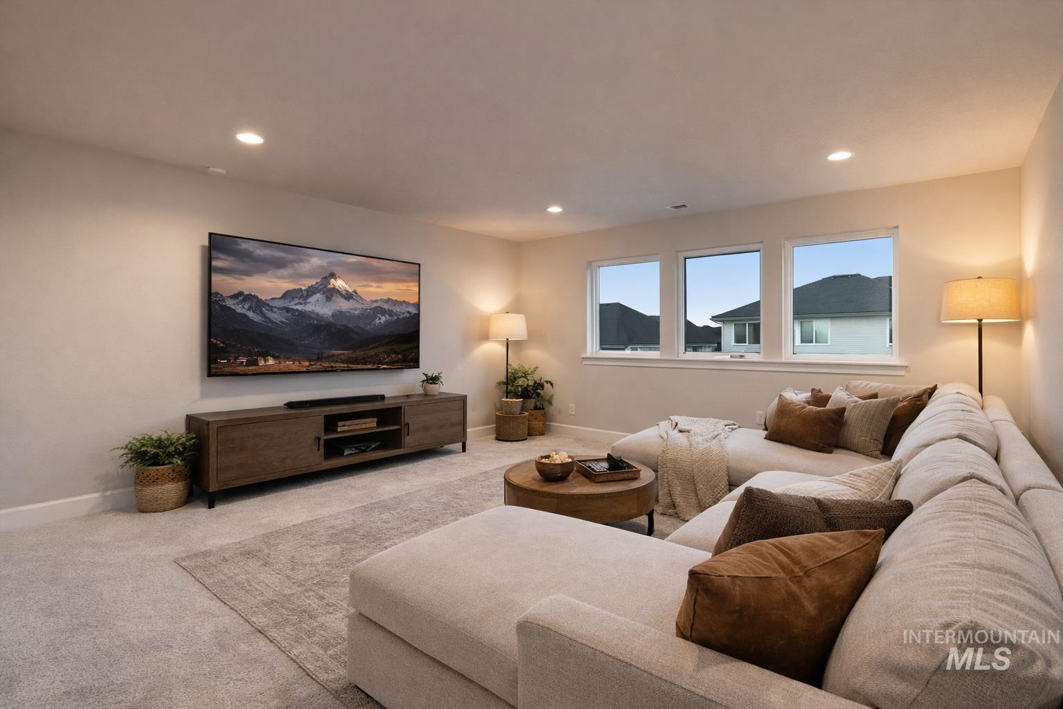 2147 East Blakehurst Avenue Kuna, ID 83634 - Photo 32 of 43 Carpeted living area with recessed lighting