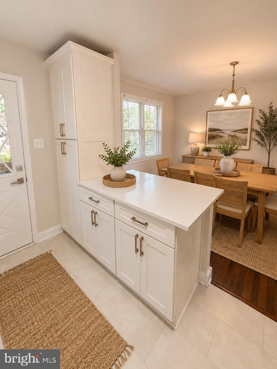 5649 Utrecht Road Baltimore, MD 21206 - Photo 18 of 42 a kitchen with cabinets and white appliances