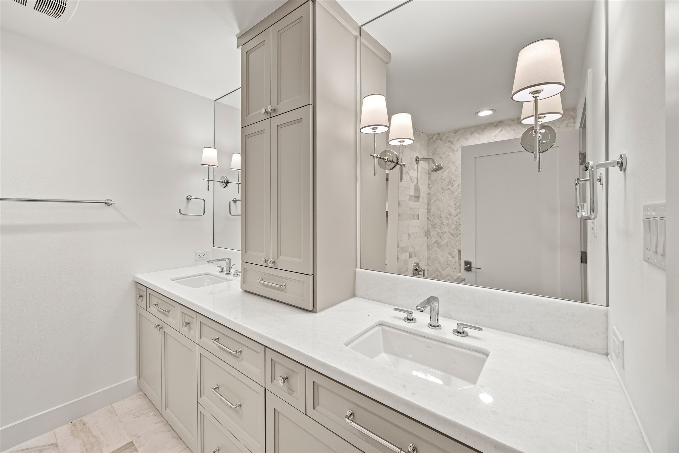 5658 Del Monte Drive Houston, TX 77056 - Photo 18 of 35 a bathroom with a double vanity sink mirror and double