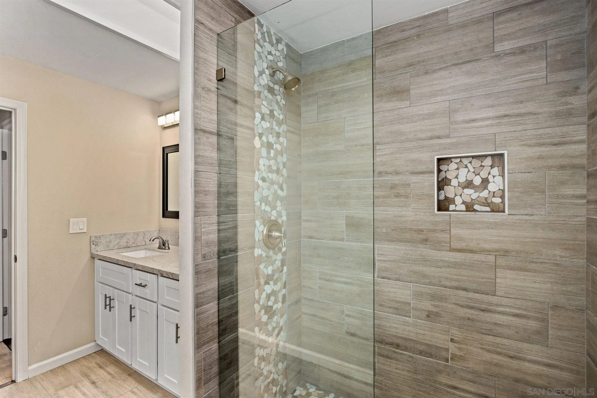 13441 Tobiasson Road Poway, CA 92064 - Photo 18 of 29 a bathroom with a shower and a sink