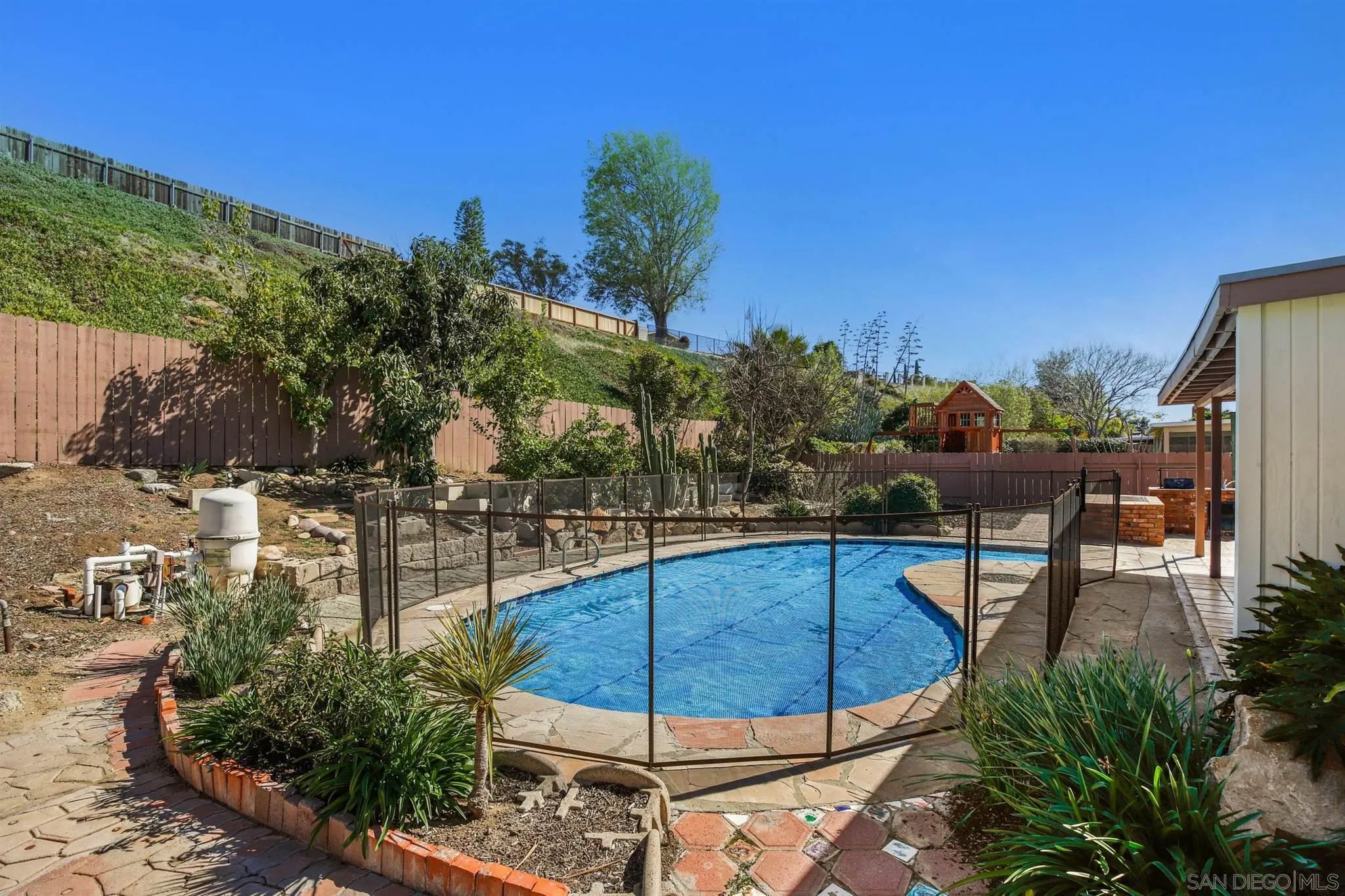13441 Tobiasson Road Poway, CA 92064 - Photo 2 of 29 a view of a swimming pool with a patio