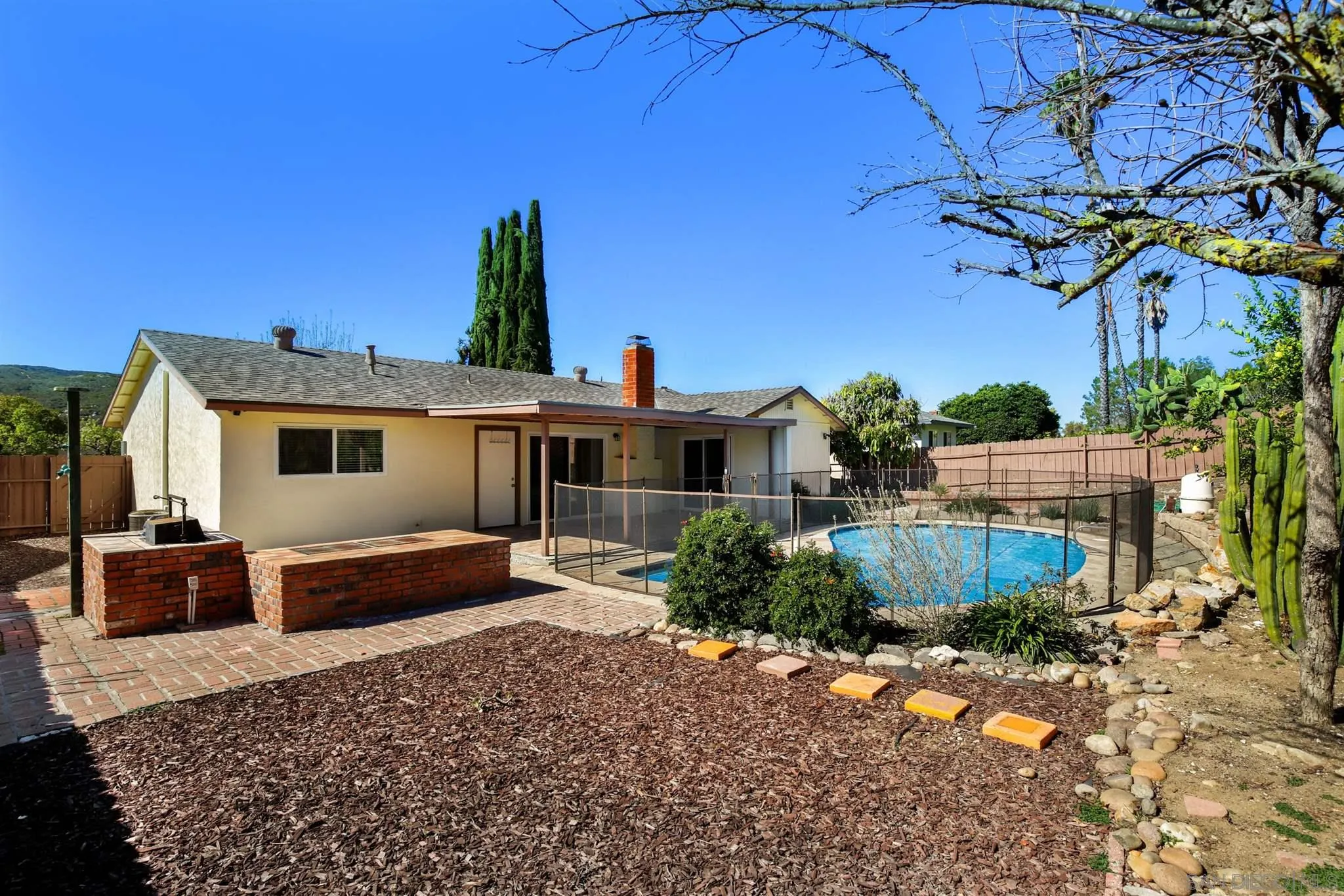 13441 Tobiasson Road Poway, CA 92064 - Photo 27 of 29 a front view of a house with a yard