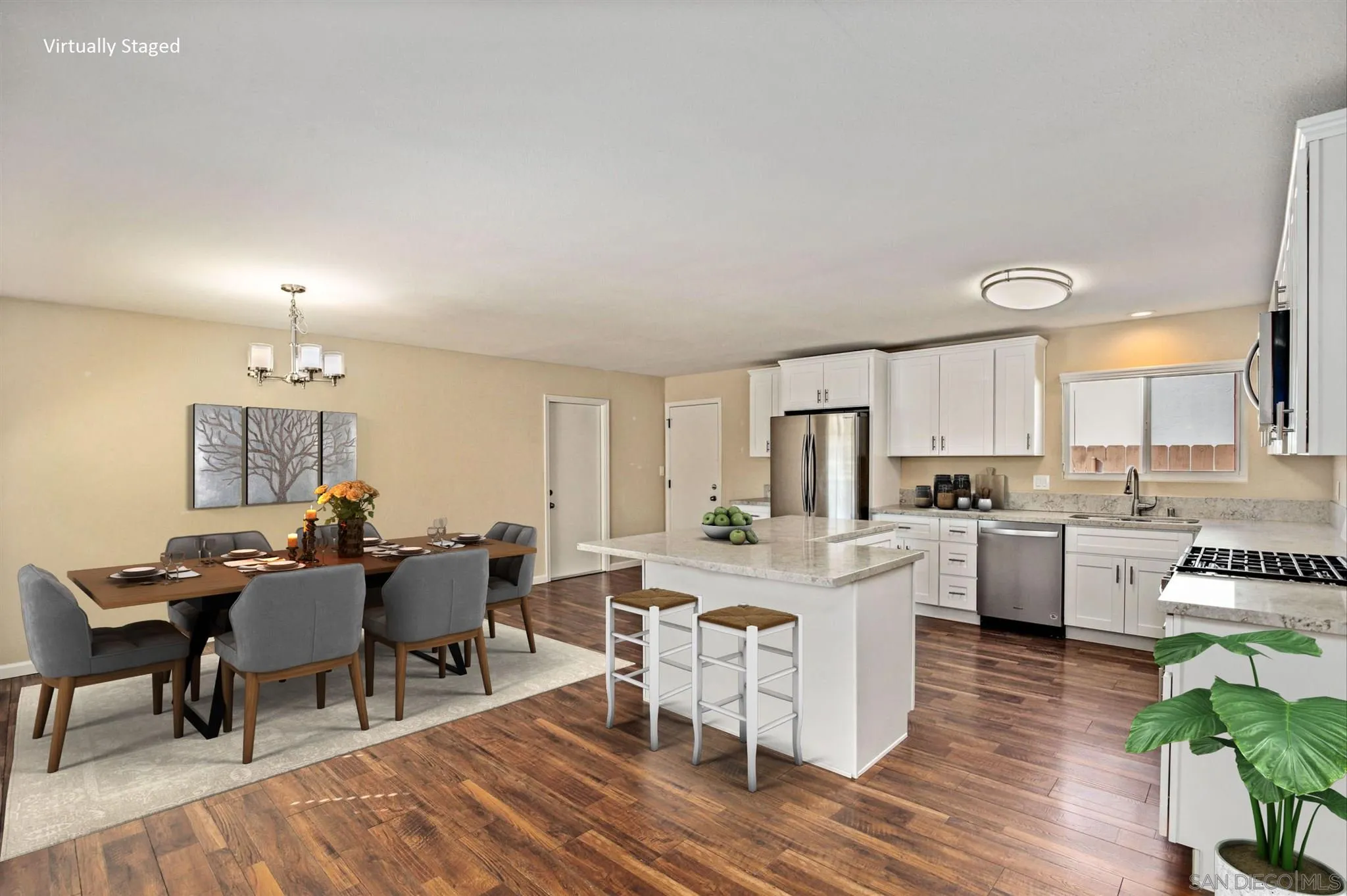 13441 Tobiasson Road Poway, CA 92064 - Photo 7 of 29 a living room with furniture a dining table and kitchen view