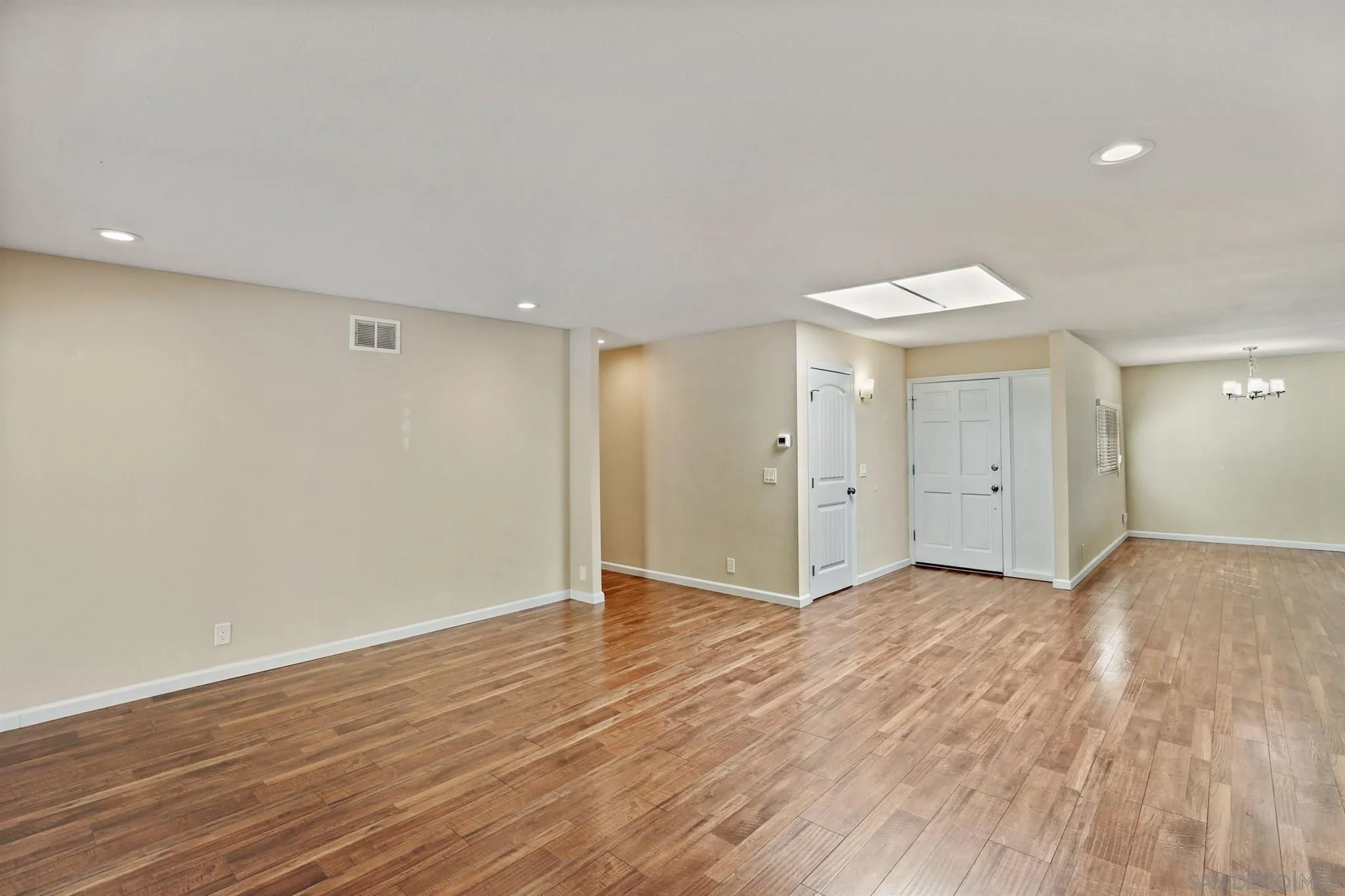 13441 Tobiasson Road Poway, CA 92064 - Photo 10 of 29 a view of an empty room with wooden floor