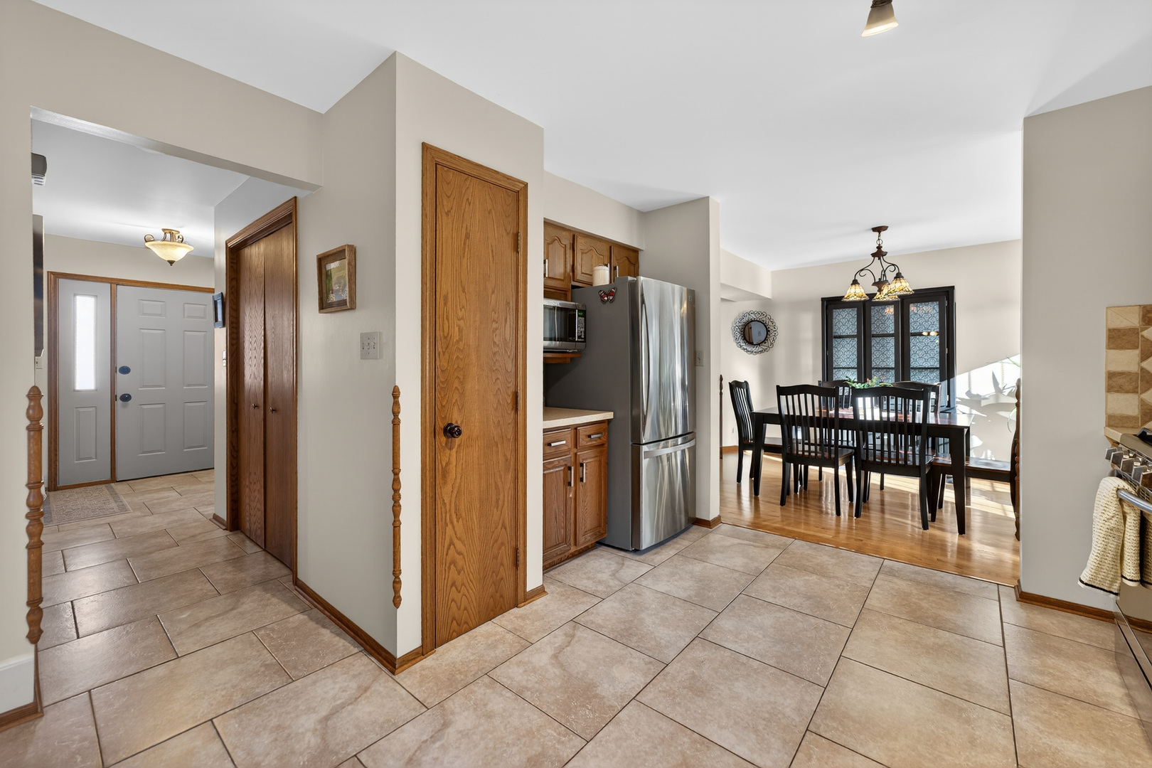 1524 John Street Sycamore, IL 60178 - Photo 13 of 52 a view of kitchen with furniture and refrigerator
