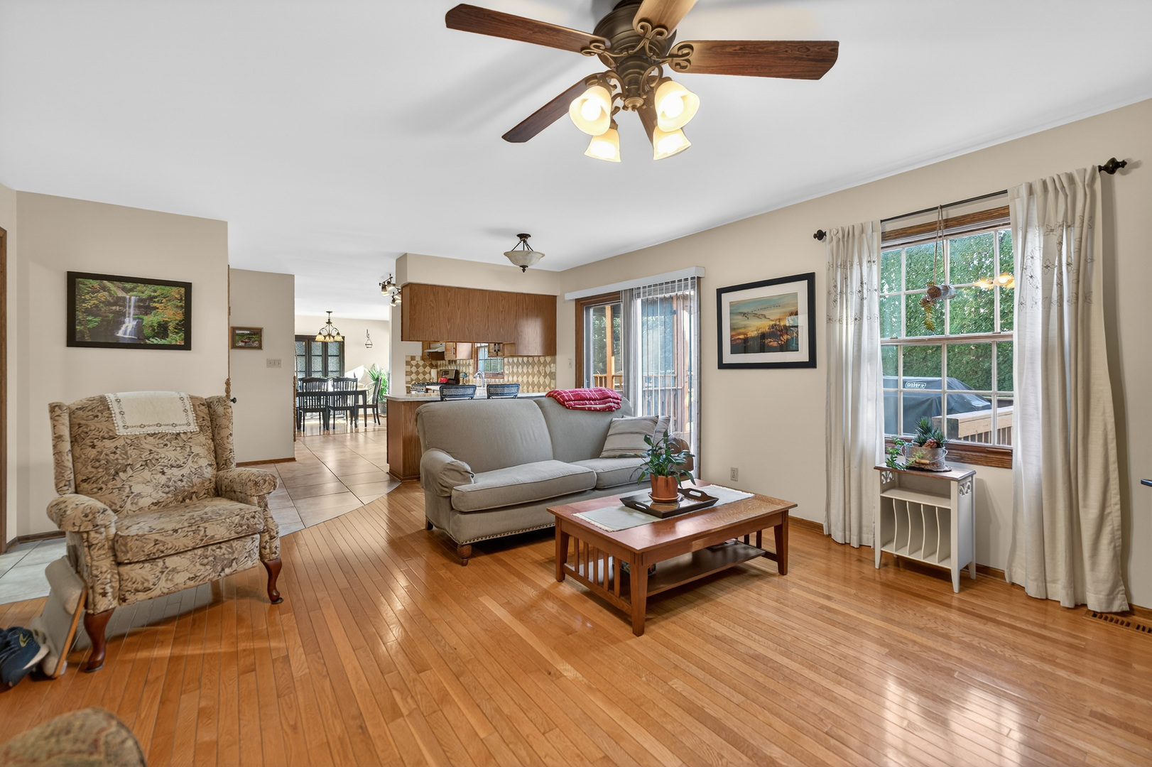 1524 John Street Sycamore, IL 60178 - Photo 15 of 52 a living room with furniture and a wooden floor