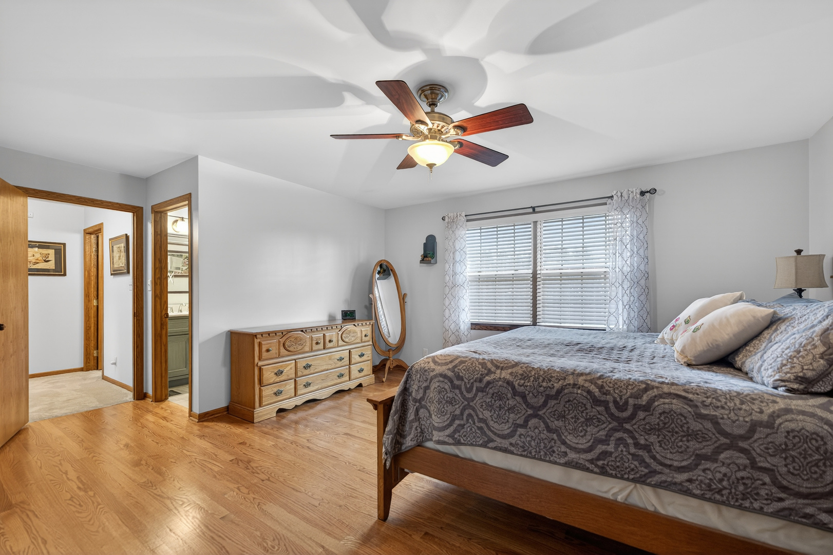 1524 John Street Sycamore, IL 60178 - Photo 20 of 52 a bedroom with a bed and wooden floor
