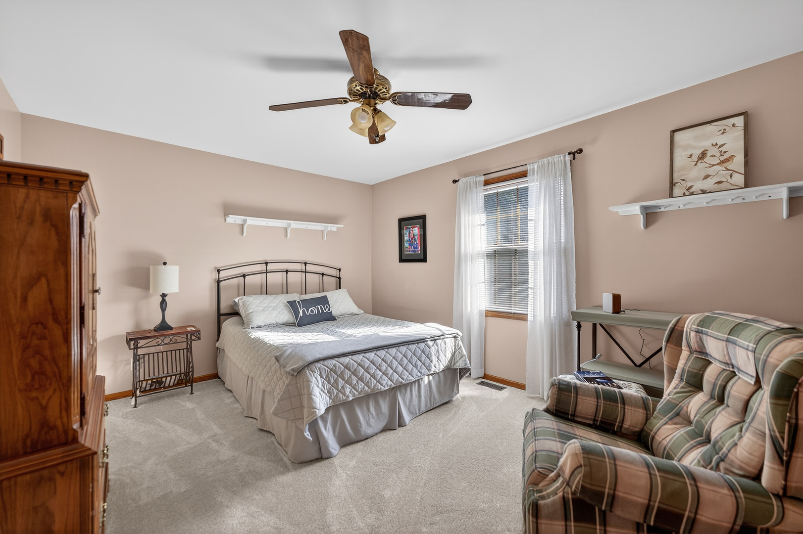 1524 John Street Sycamore, IL 60178 - Photo 22 of 52 a bedroom with a bed and wooden floor