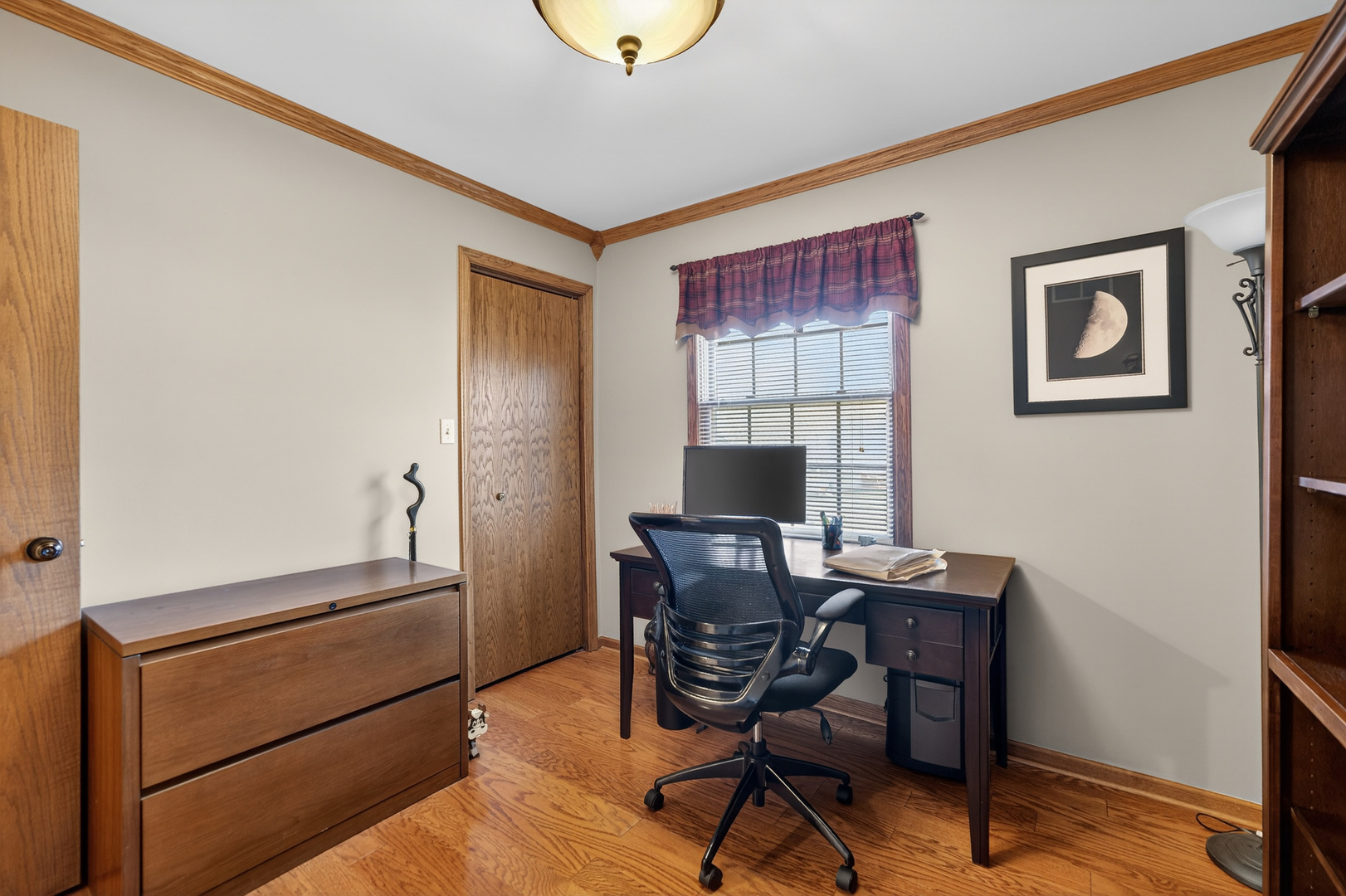 1524 John Street Sycamore, IL 60178 - Photo 24 of 52 a view of a workspace with furniture and a window
