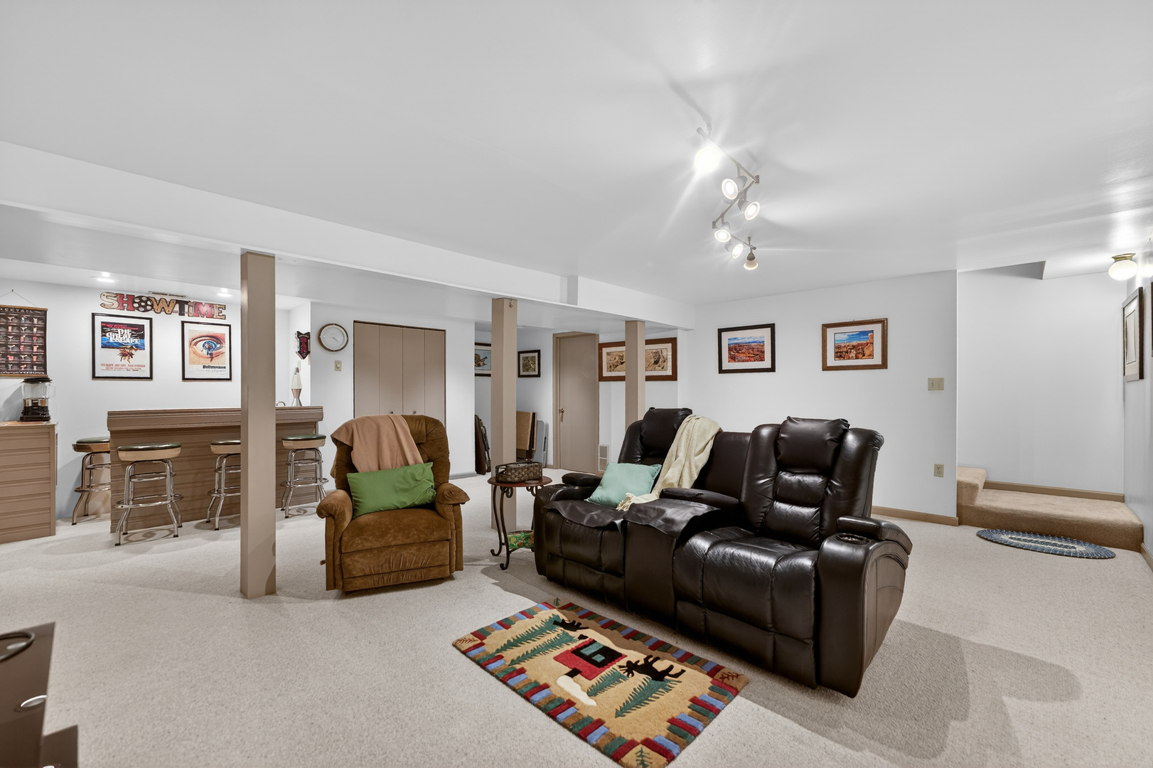 1524 John Street Sycamore, IL 60178 - Photo 28 of 52 a living room with furniture and a fireplace