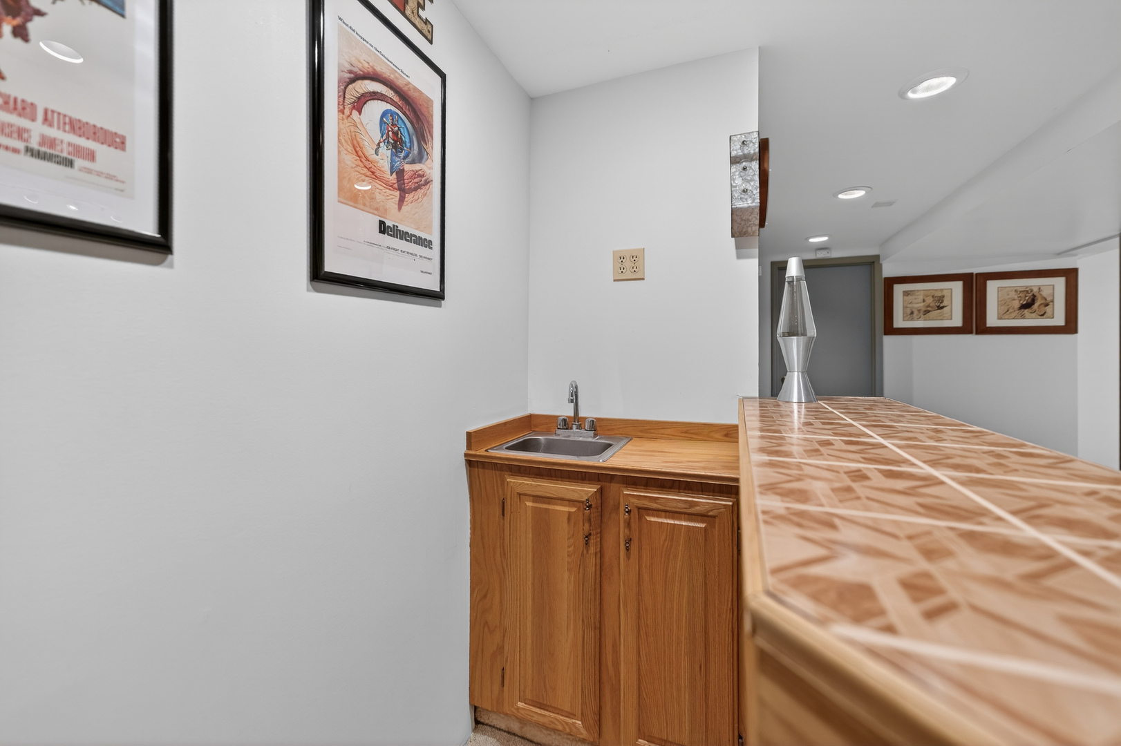 1524 John Street Sycamore, IL 60178 - Photo 30 of 52 a bathroom with a granite countertop sink and a mirror