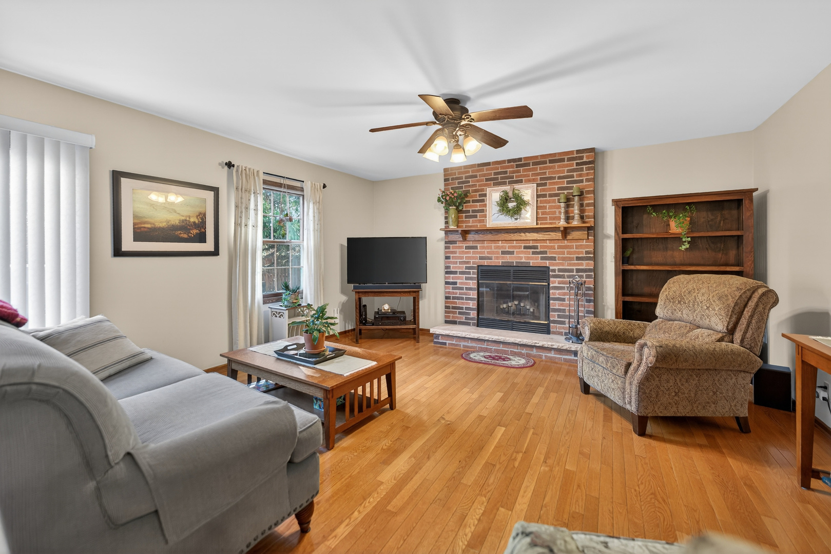 1524 John Street Sycamore, IL 60178 - Photo 3 of 52 a bedroom with furniture and a fireplace