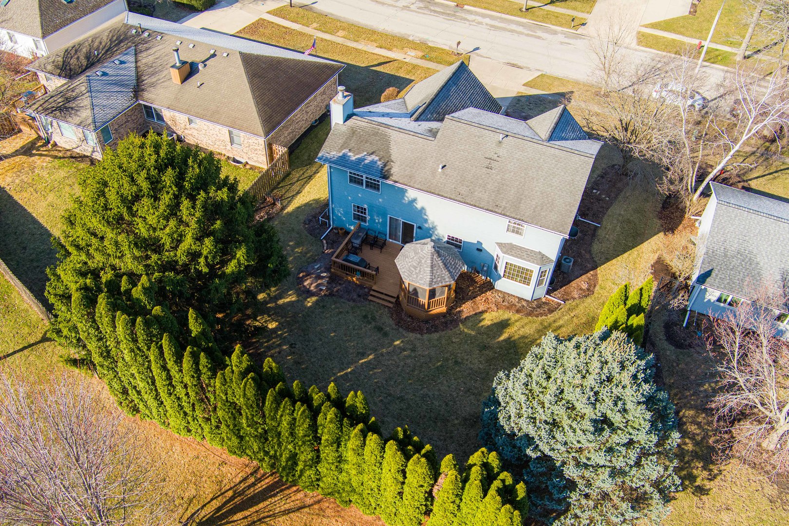 1524 John Street Sycamore, IL 60178 - Photo 42 of 52 an aerial view of a house with a yard