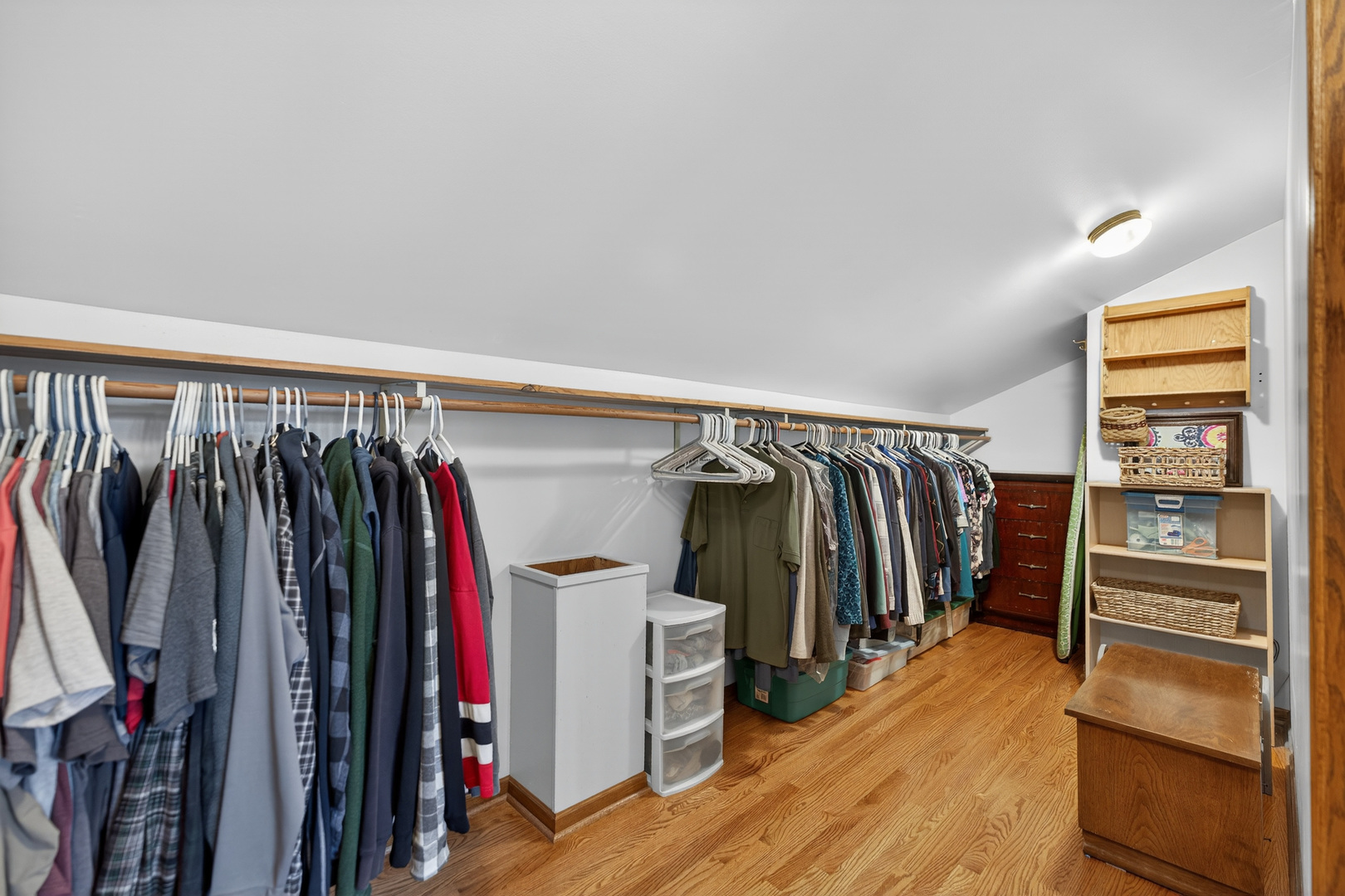 1524 John Street Sycamore, IL 60178 - Photo 5 of 52 a view of walk in closet with clothes and shoes