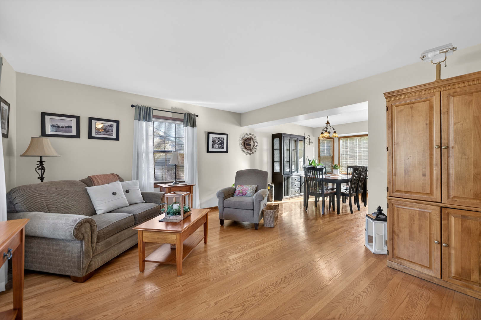 1524 John Street Sycamore, IL 60178 - Photo 7 of 52 a living room with furniture dining table and a refrigerator