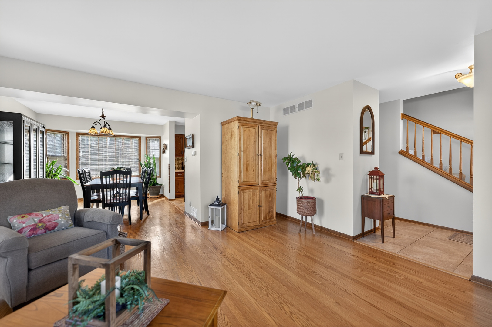 1524 John Street Sycamore, IL 60178 - Photo 9 of 52 a living room with furniture and a wooden floor