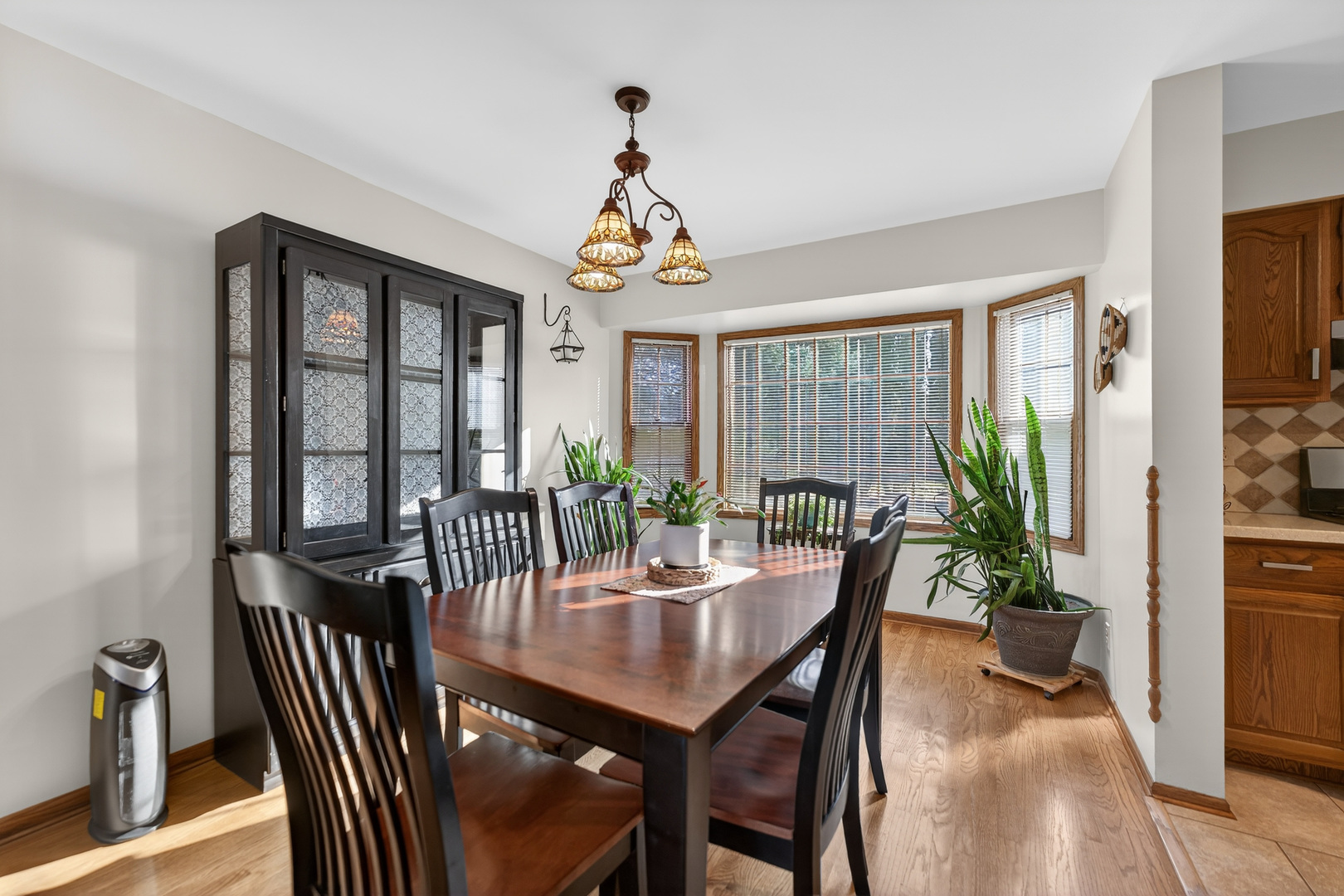1524 John Street Sycamore, IL 60178 - Photo 10 of 52 a view of a dining room with furniture window and wooden floor