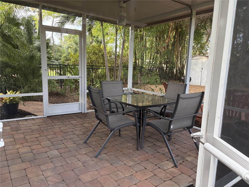 421 Riviera Street Venice, FL 34285 - Photo 25 of 30 a view of a porch with chairs and backyard