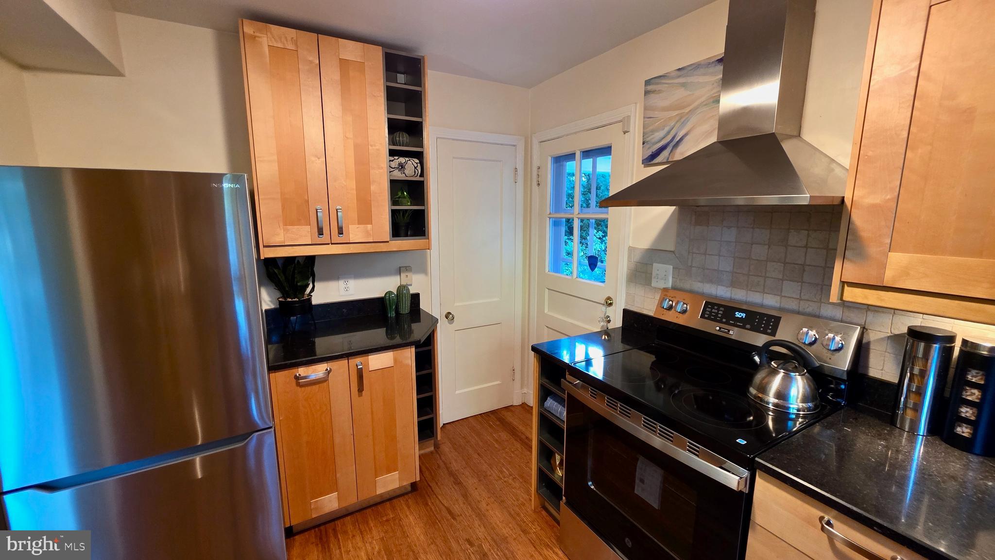 10309 Ridgemoor Drive Silver Spring, MD 20901 - Photo 26 of 139 a kitchen with stainless steel appliances a stove a sink and a refrigerator