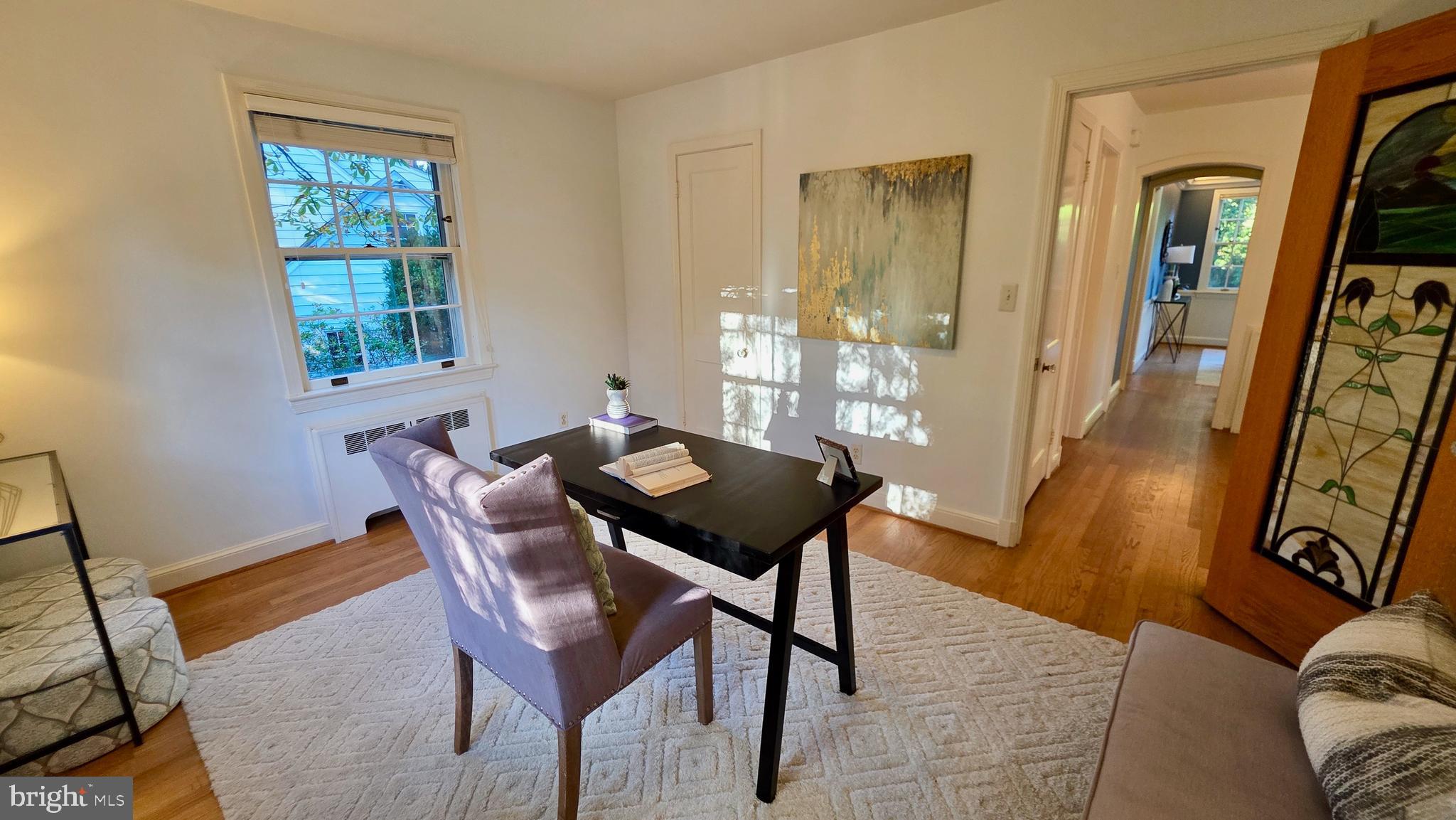 10309 Ridgemoor Drive Silver Spring, MD 20901 - Photo 37 of 139 a view of a dining room with furniture and wooden floor