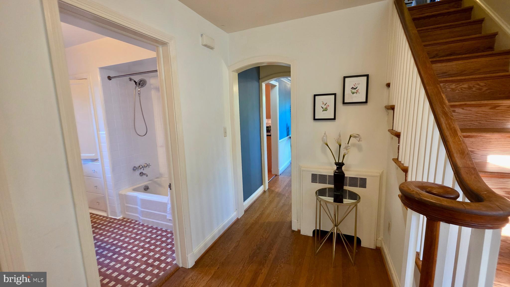 10309 Ridgemoor Drive Silver Spring, MD 20901 - Photo 38 of 139 a view of a hallway with furniture and wooden floor