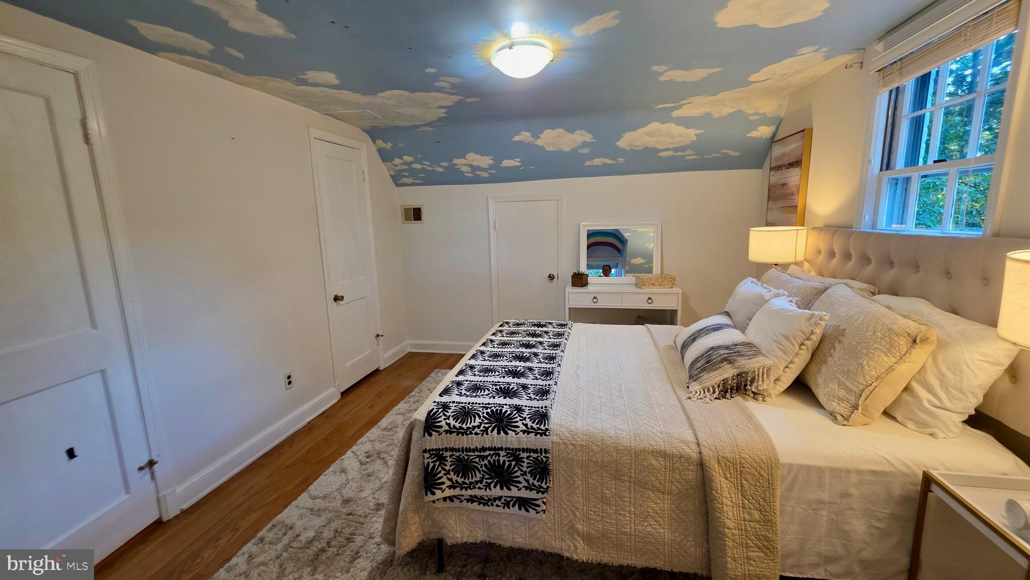 10309 Ridgemoor Drive Silver Spring, MD 20901 - Photo 60 of 139 a bedroom with a bed and a window