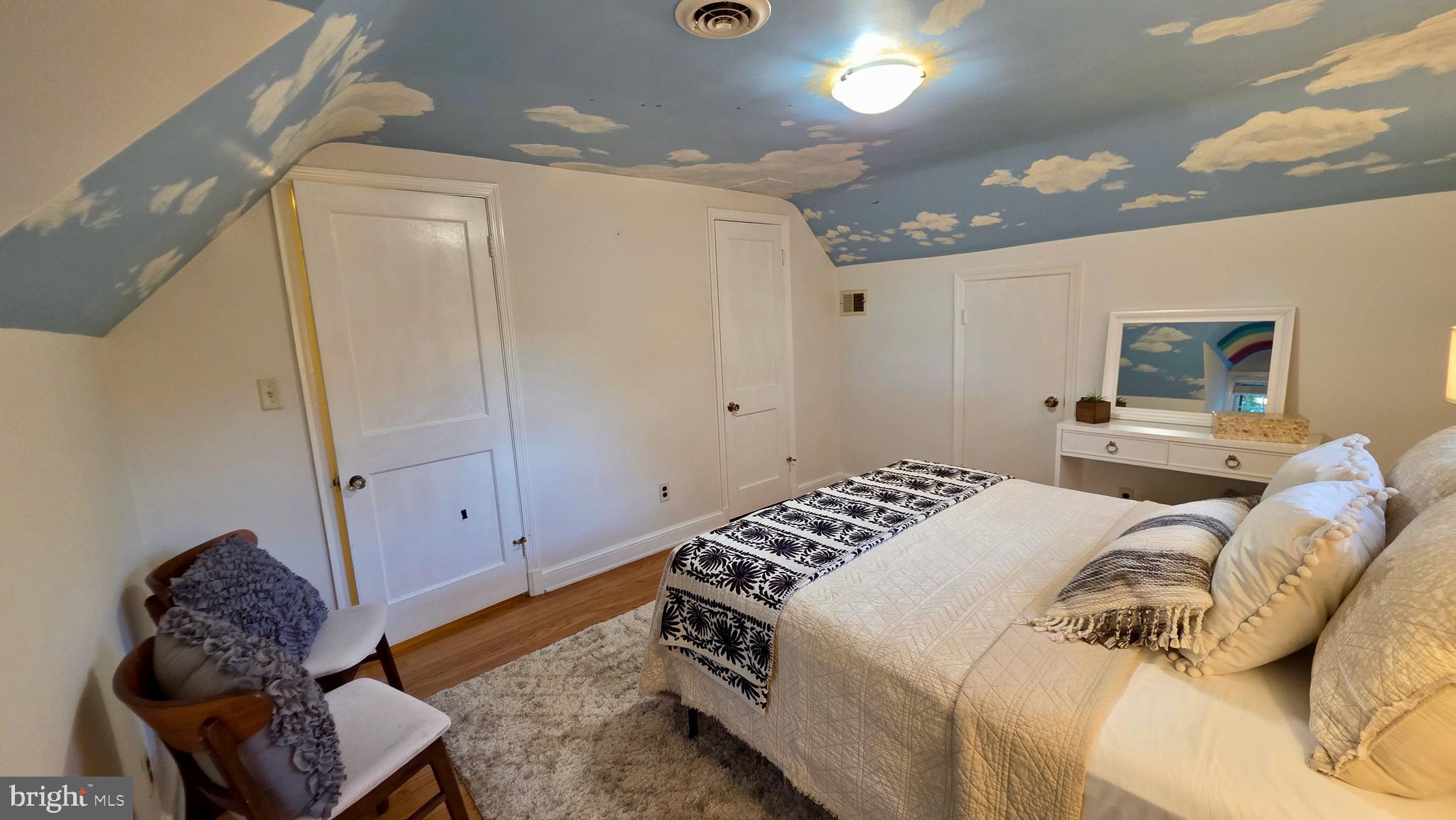 10309 Ridgemoor Drive Silver Spring, MD 20901 - Photo 61 of 139 a bedroom with a bed and a mirror