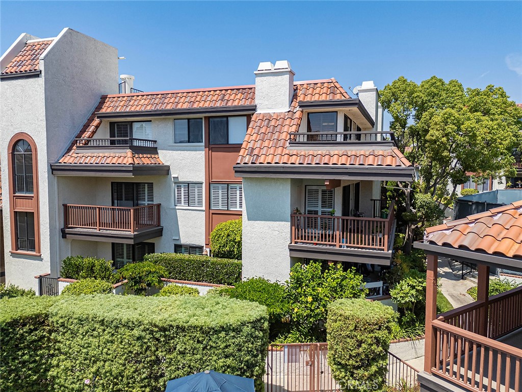 a front view of a house with a balcony
