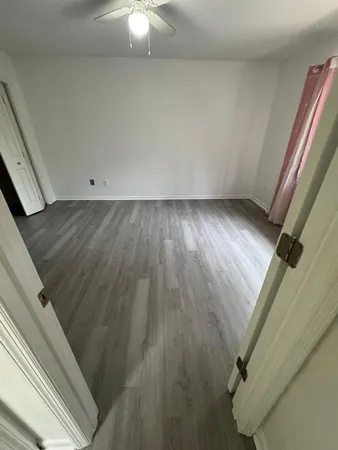 a view of wooden floor and staircase