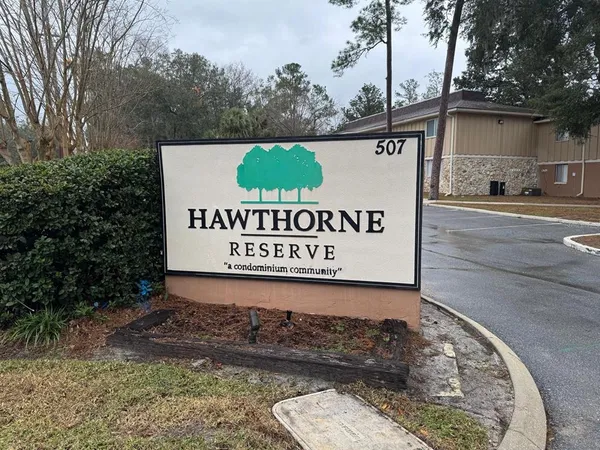 a sign on the side of the road