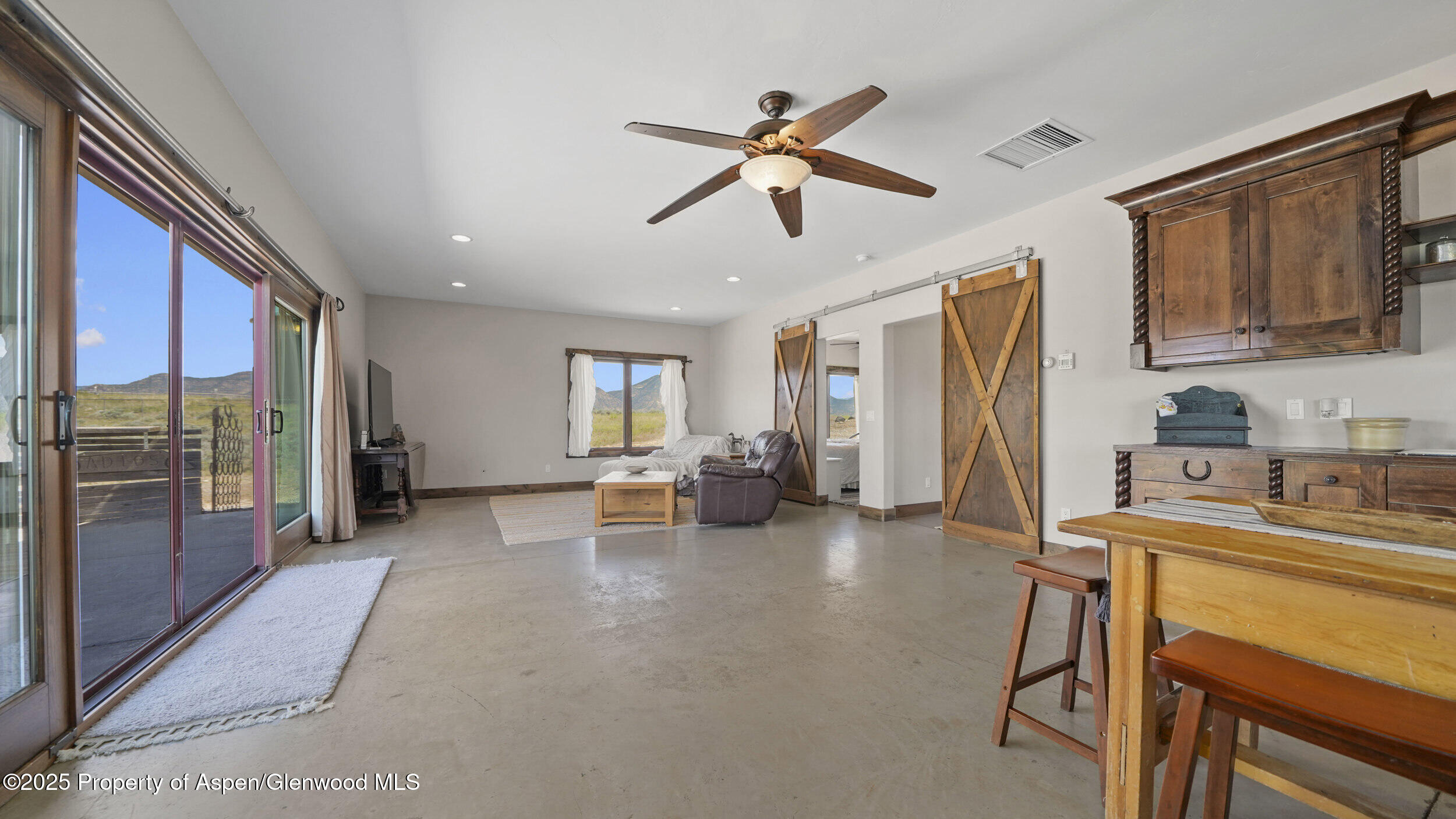 164 Booms Place Rifle, CO 81650 - Photo 12 of 33 a view of a livingroom with furniture and a ceiling fan