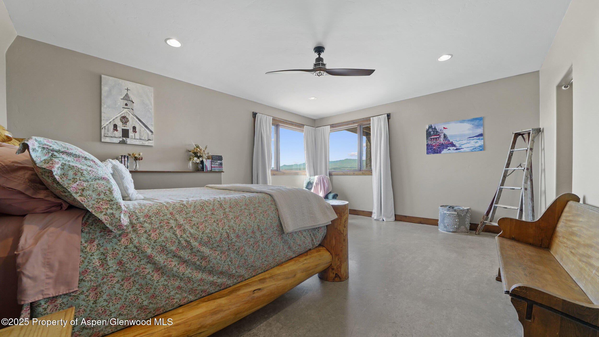 164 Booms Place Rifle, CO 81650 - Photo 16 of 33 a bed room with a bed and a couch