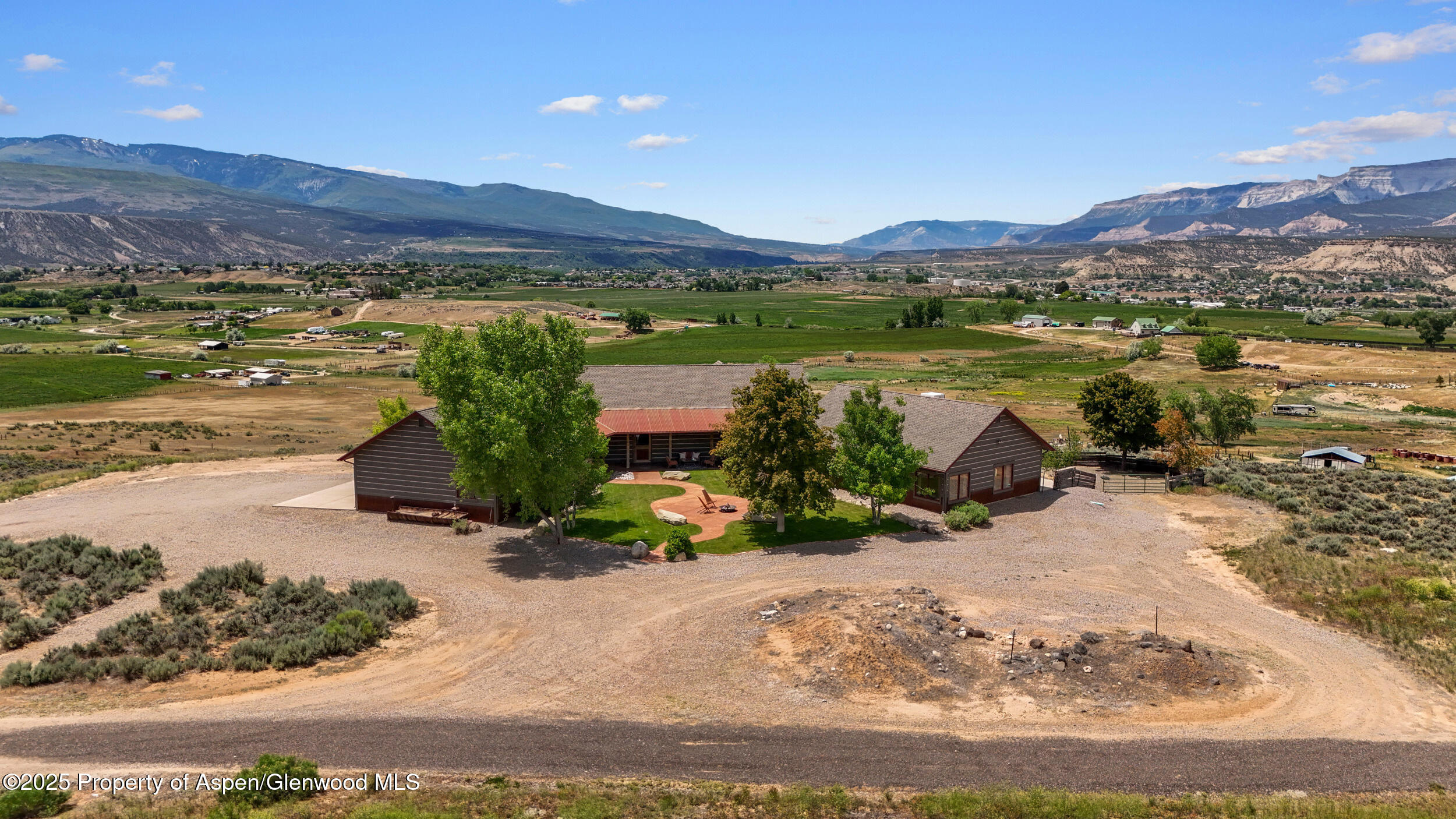 164 Booms Place Rifle, CO 81650 - Photo 27 of 33 a view of a lake with a mountain