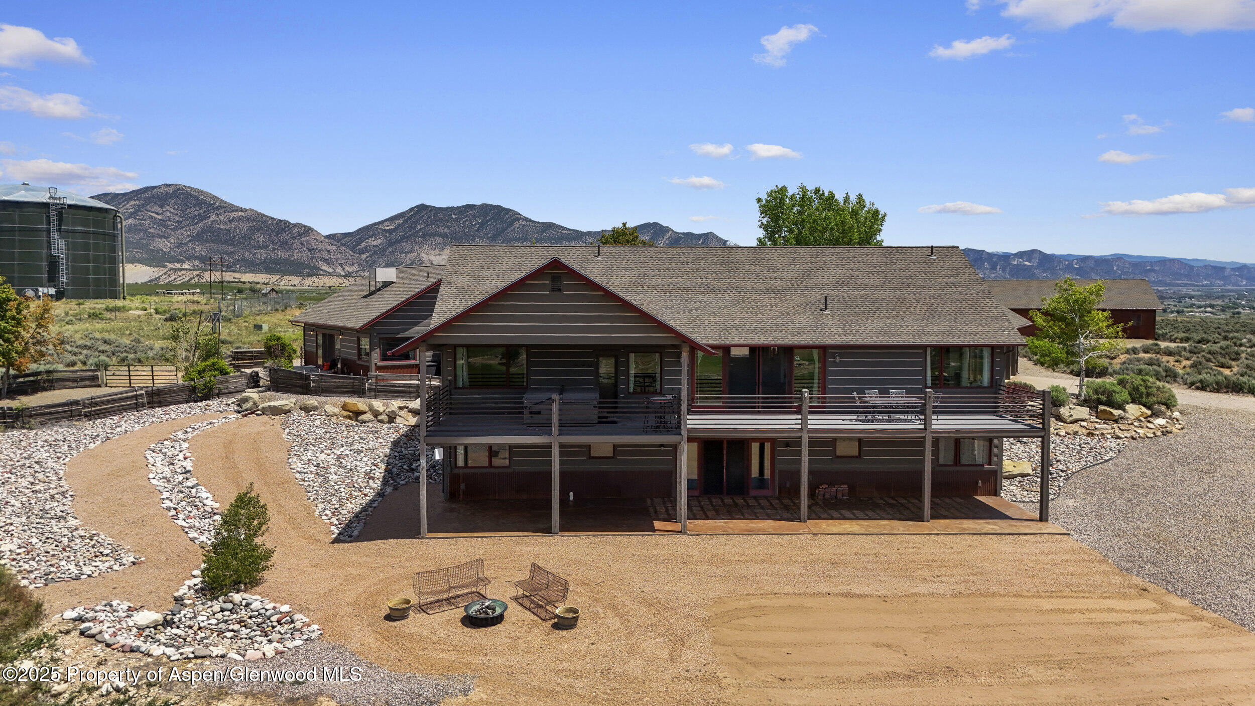 164 Booms Place Rifle, CO 81650 - Photo 4 of 33 a view of a house with a yard
