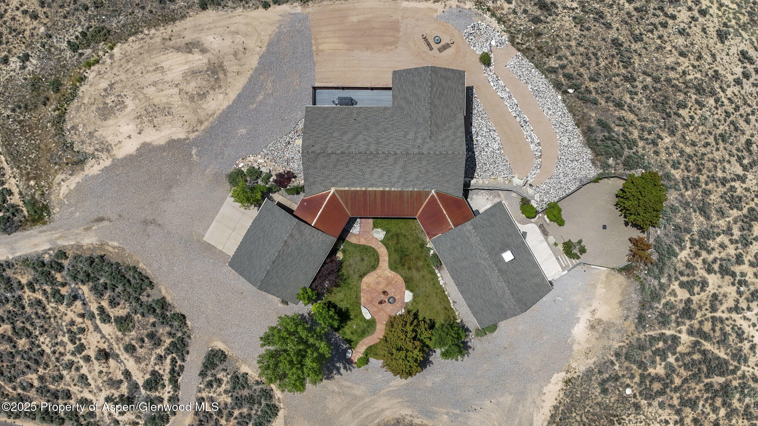 164 Booms Place Rifle, CO 81650 - Photo 5 of 33 an aerial view of a house with a yard