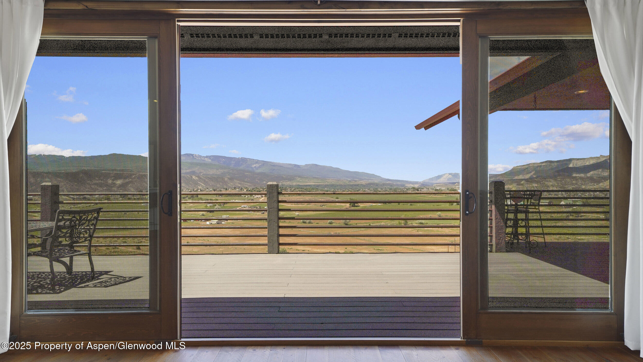 164 Booms Place Rifle, CO 81650 - Photo 9 of 33 a view of a balcony from a door