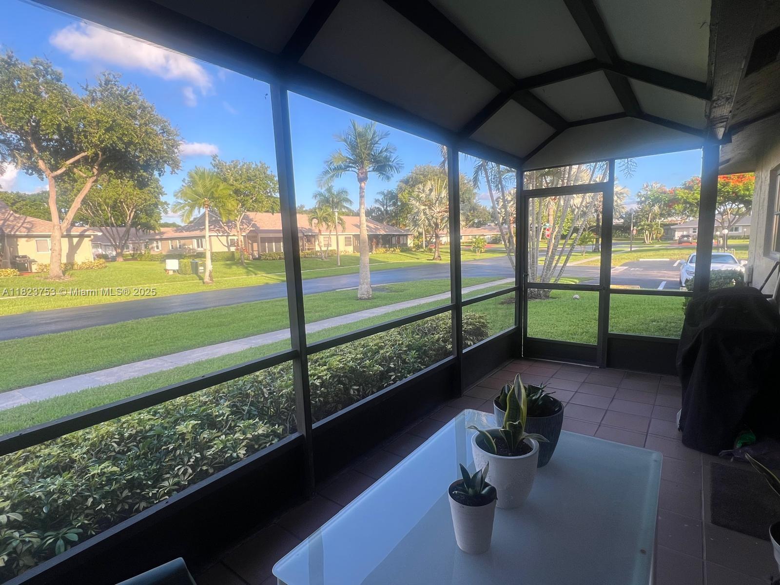 18906 Schooner Drive Boca Raton, FL 33496 - Photo 15 of 15 a view of a porch and garden