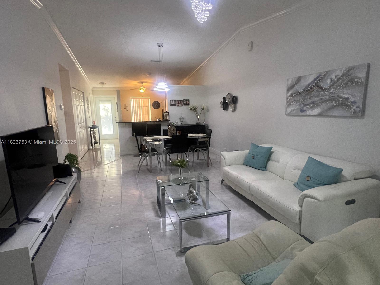 18906 Schooner Drive Boca Raton, FL 33496 - Photo 4 of 15 a living room with furniture and a fireplace