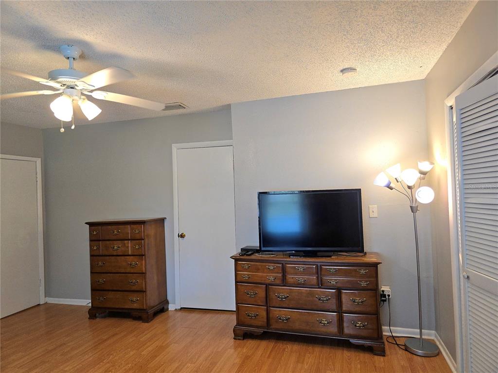 1839 Salem Road, Unit B Lakeland, FL 33803 - Photo 11 of 24 a living room with furniture and a flat screen tv