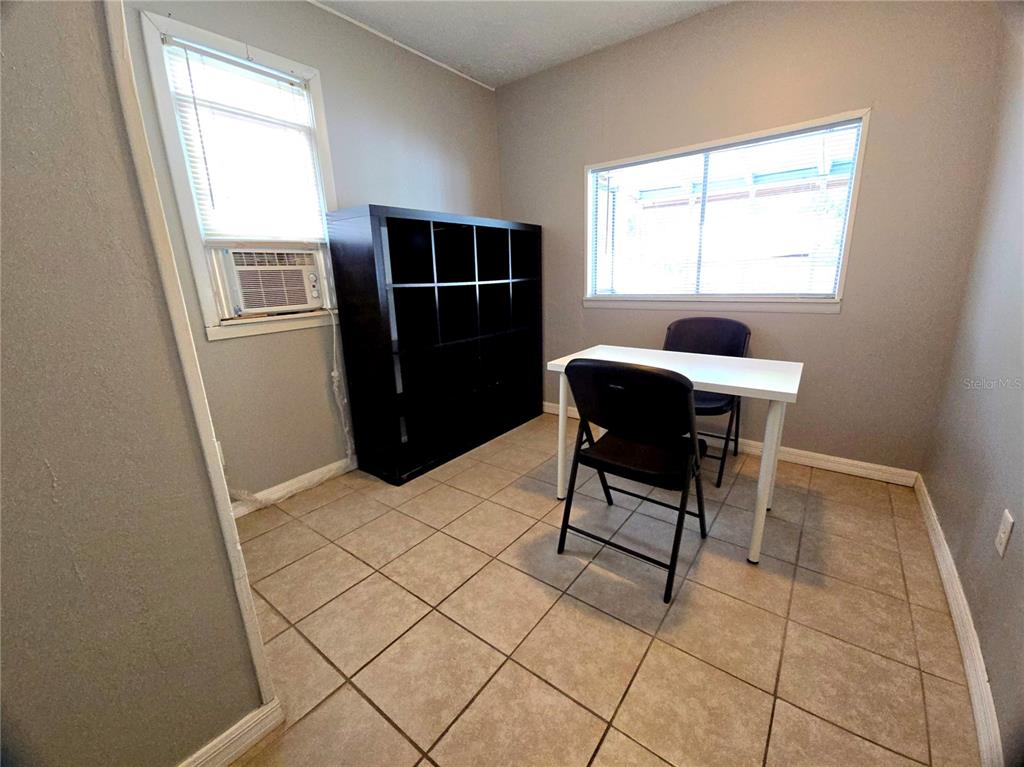 1839 Salem Road, Unit B Lakeland, FL 33803 - Photo 13 of 24 a living room with furniture and a window