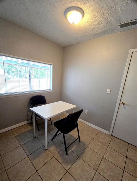 1839 Salem Road, Unit B Lakeland, FL 33803 - Photo 14 of 24 a workspace with furniture and window