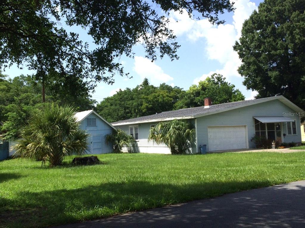 1839 Salem Road, Unit B Lakeland, FL 33803 - Photo 23 of 24 a front view of house with yard and green space