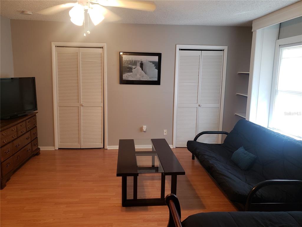 1839 Salem Road, Unit B Lakeland, FL 33803 - Photo 7 of 24 a living room with furniture and a flat screen tv