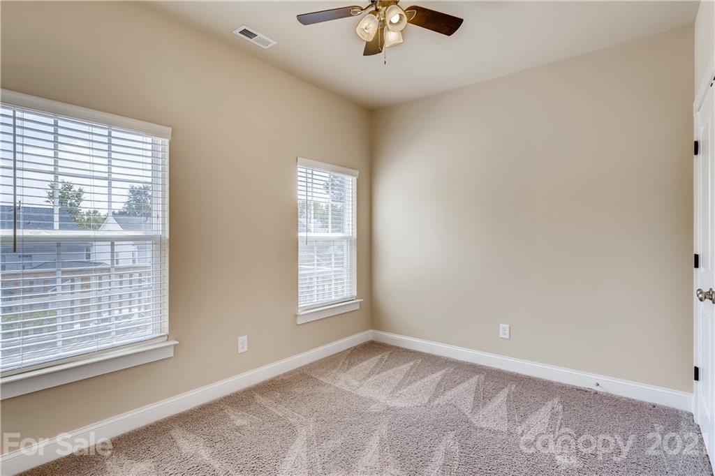 12208 Huntersville-Concord Road Huntersville, NC 28078 - Photo 14 of 33 an empty room with a window