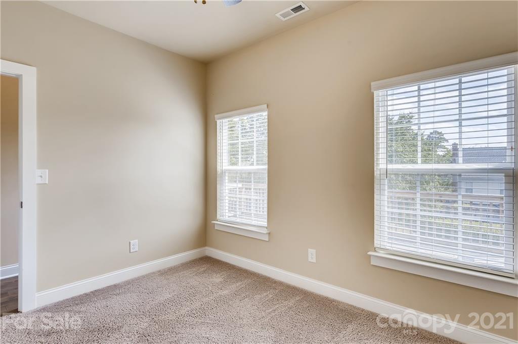 12208 Huntersville-Concord Road Huntersville, NC 28078 - Photo 15 of 33 a view of an empty room with a window