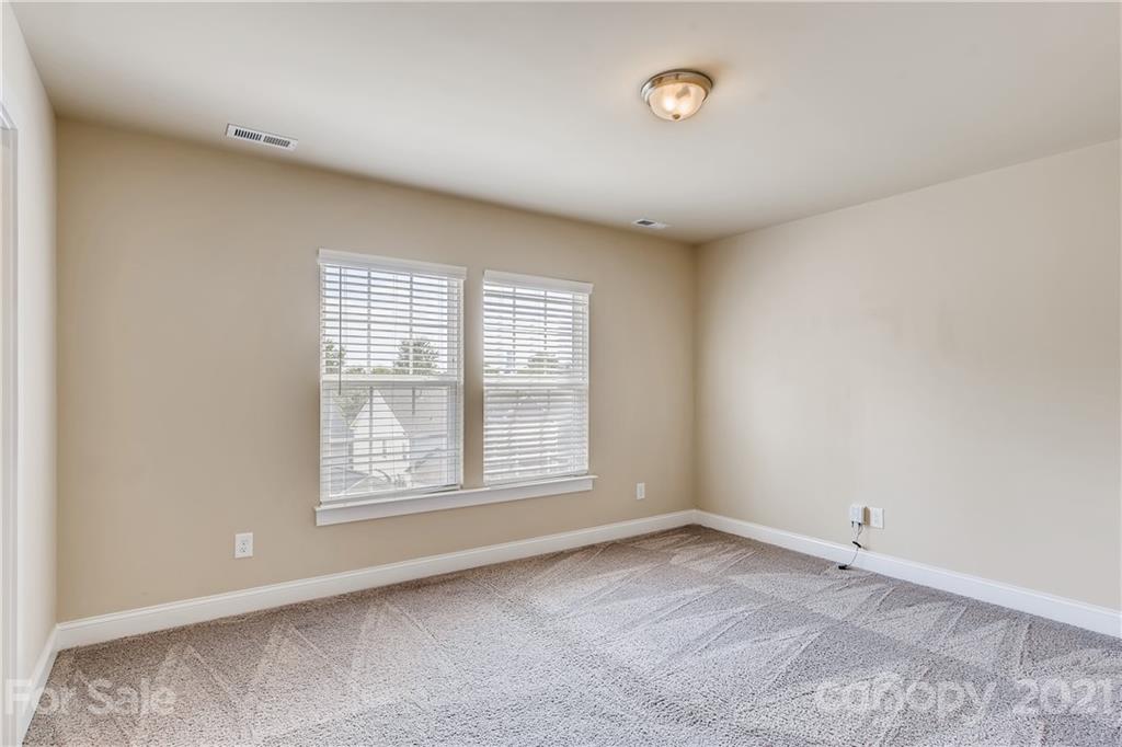 12208 Huntersville-Concord Road Huntersville, NC 28078 - Photo 25 of 33 an empty room with a window