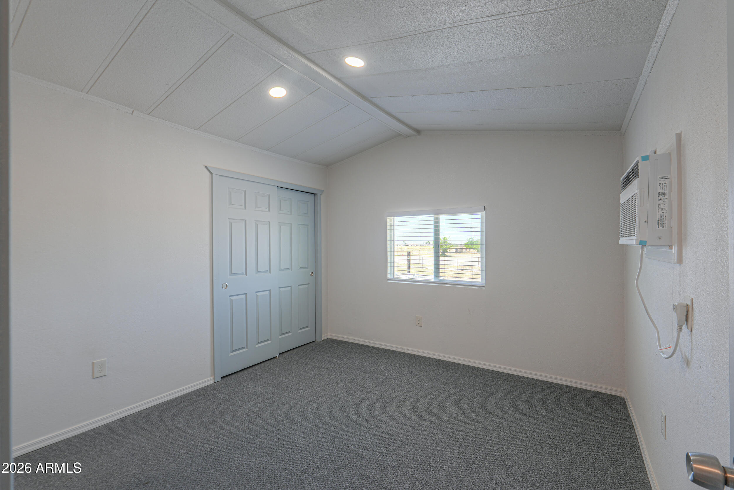 33776 West Siesta Road Stanfield, AZ 85172 - Photo 50 of 54 a view of an empty room with a window