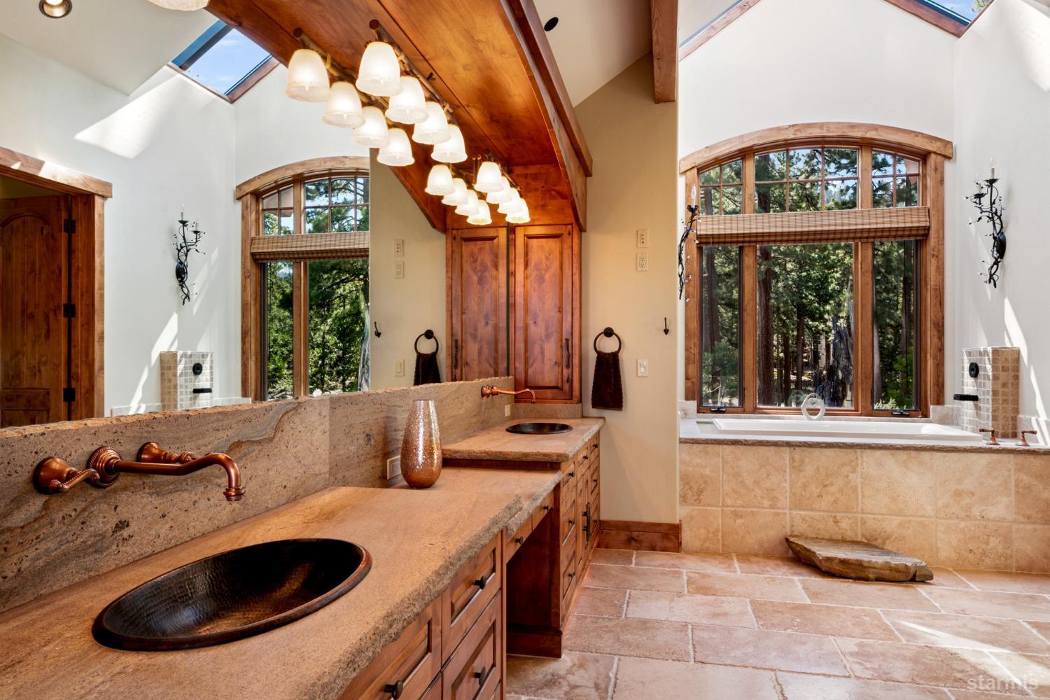 3567 Saddle Road South Lake Tahoe, CA 96150 - Photo 26 of 39 a bathroom with a sink and a mirror