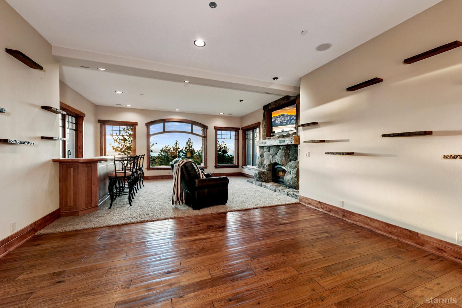 3567 Saddle Road South Lake Tahoe, CA 96150 - Photo 29 of 39 a living room with furniture and a wooden floor